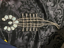 Dry Creek squash, blossom necklace with two strands of beads