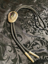 The Black Jack turquoise oval bolo