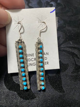 Steve Hallow, Zuni, snake eye strip earrings