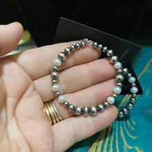 Round fresh water pearls and Navajo pearl earrings