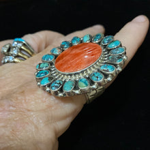 Orange spiny center with a turquoise surround