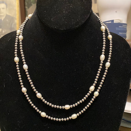 Single strand fresh water pearls spaced with Navajo PEARLS