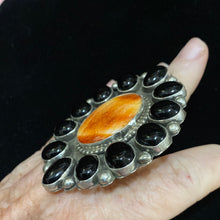 Black onyx and orange spiny ring
