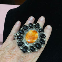 Black onyx and orange spiny ring