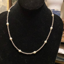 Single strand fresh water pearls spaced with Navajo PEARLS