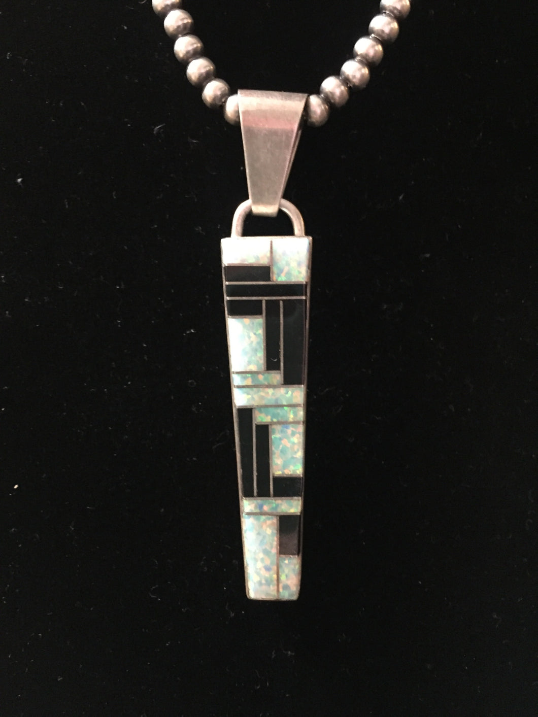 The Zuni black onyx and Opal at it's best