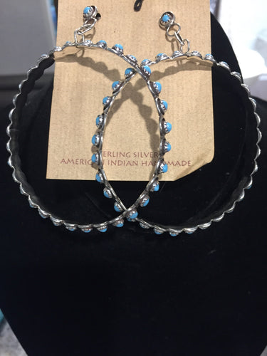 Huge sleeping beauty hoop earrings