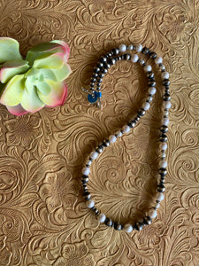 Freshwater pearls and Navajo pearls 24 inches 6mm