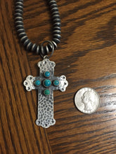 "The Hammered snake eyes" 2 different size Turquoise