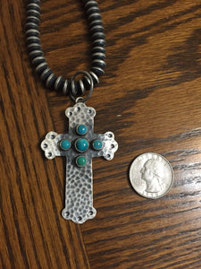 "The Hammered snake eyes" 2 different size Turquoise