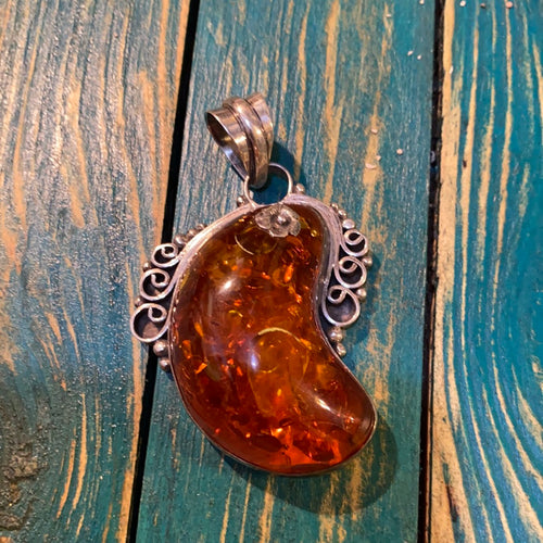 The Amber crescent moon pendant
