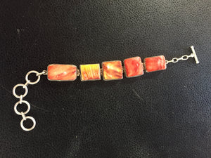 Small orange spiny oyster clasp bracelet