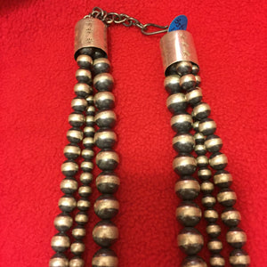 3 strand 18 inch Navajo pearl necklace with large bell