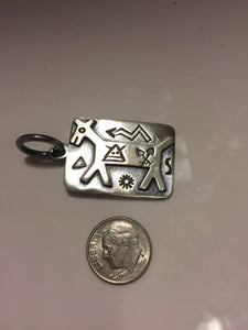 Solid Sterling Silver charm with Native American symbols