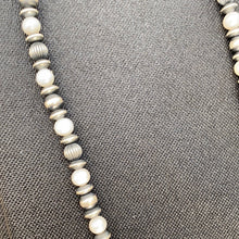 Fresh water pearls and Navajo pearls 24 inches 6mm