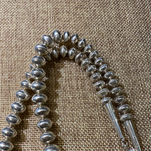 Totally tooled sterling silver bead necklace