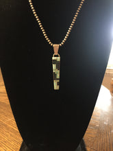 The Zuni black onyx and Opal at it's best