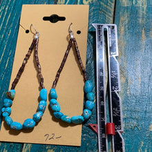 “Turquoise and Heishi bead" earrings