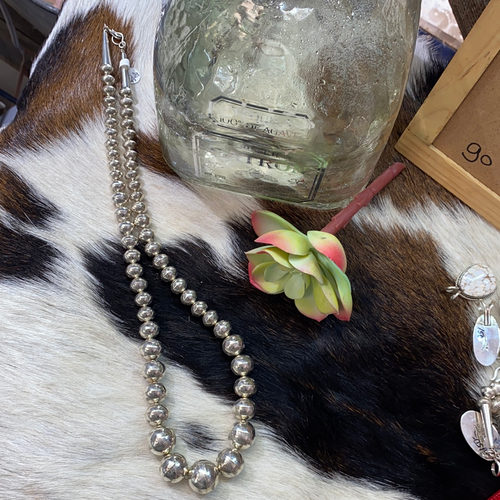 30 inch Multi size tooled bead necklace.