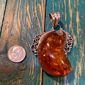 The Amber crescent moon pendant