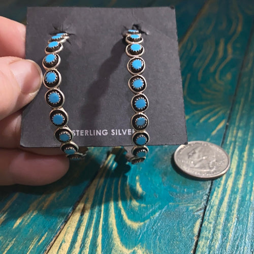 Oval hoop snake eye earrings