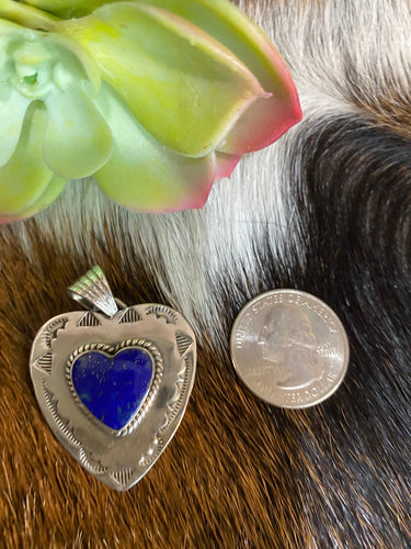 “The Lapis Double Heart” pendant.