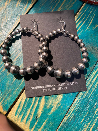 The Navajo Pearl Circle earrings