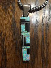 The Zuni black onyx and Opal at it's best