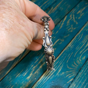 The “floating flower” sterling silver bracelet