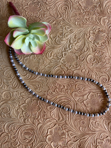 Freshwater pearls and Navajo pearls 22 inch