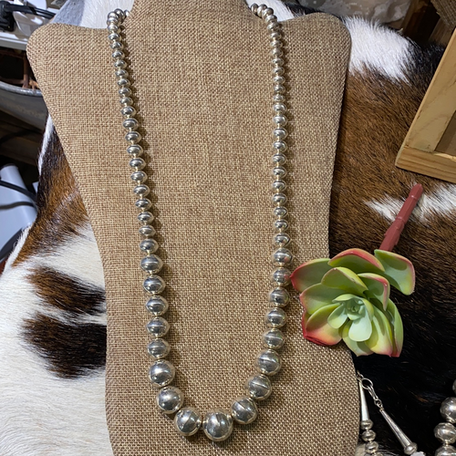 Totally tooled sterling silver bead necklace