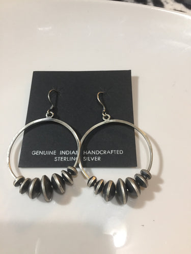 Disk Navajo pearl earrings